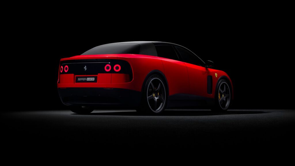 Ferrari Luce four-door EV in red, rear three-quarter view showing the taillights and Luce badge